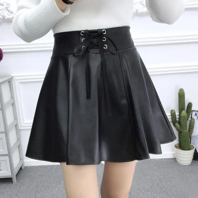 Малка кожена пола с висока талия, дамски лятна тънка пола трапецовидна форма 2021, темпераментен къса пола, модни пола на пролет-есен